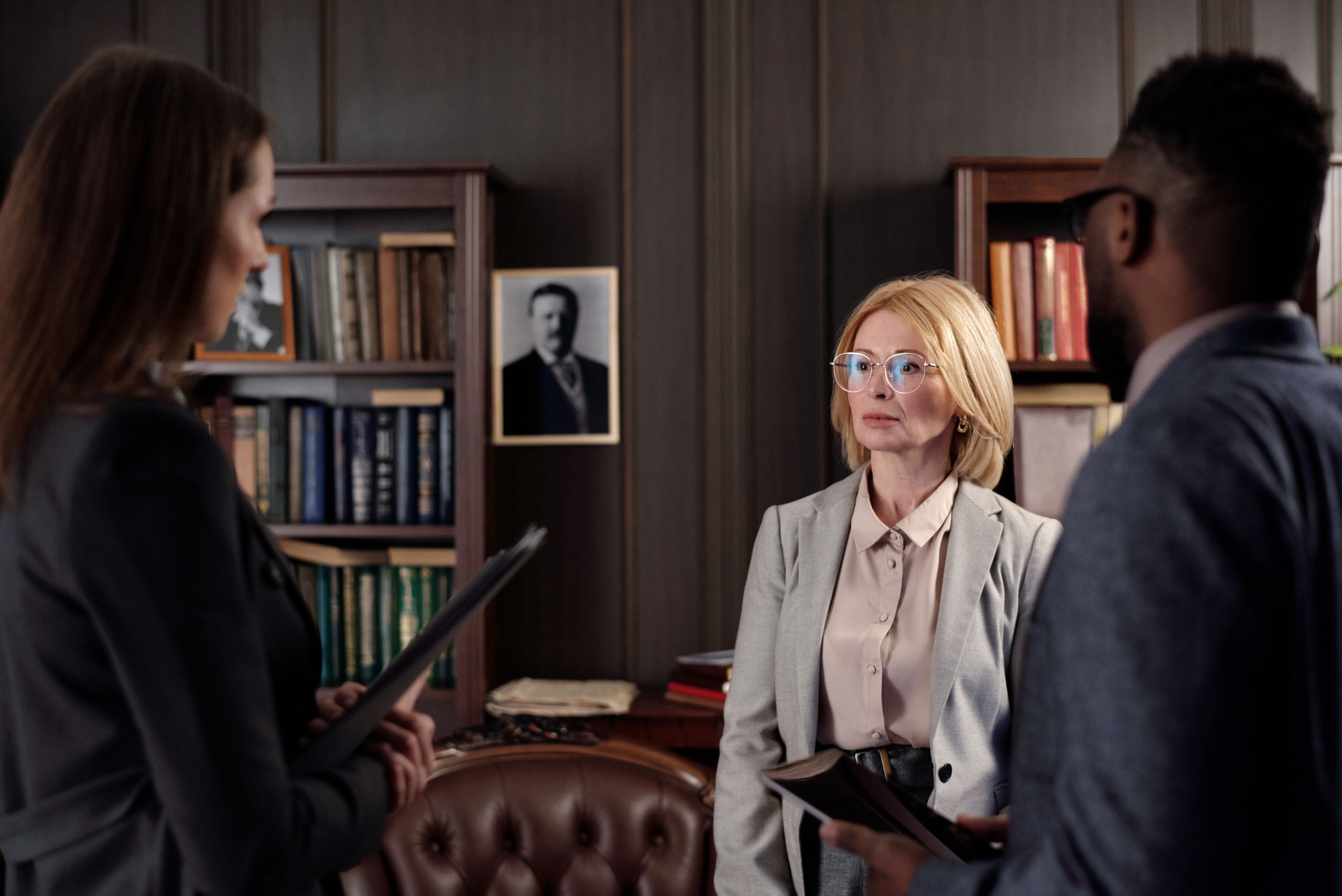 Counsel reviewing papers together in chambers